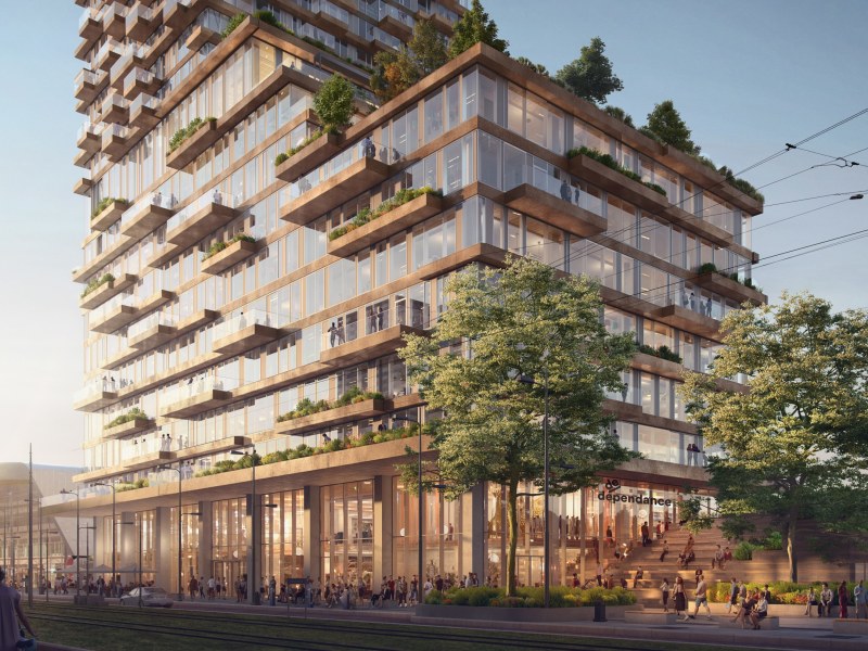 Impressie Tree House met balkonnen en bomen